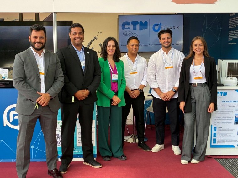 Representantes de CTN y OCNARK tras la firma del acuerdo.
